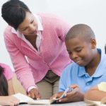 Teacher-reading-with-child